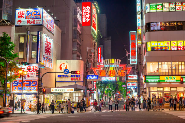 Osaka, Japan - May 28, 2016: Colourful illuminated buildings in Dotonbori at night.