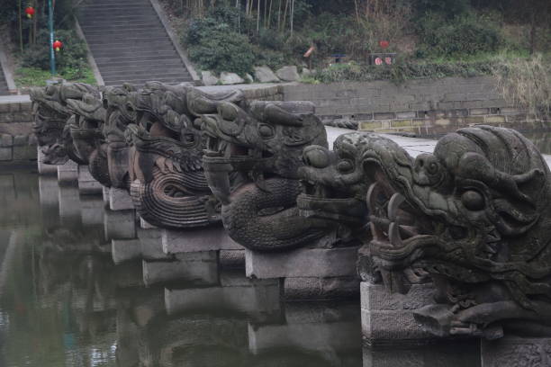 istock Ancient stone bridge with dragon carvings 2155281628