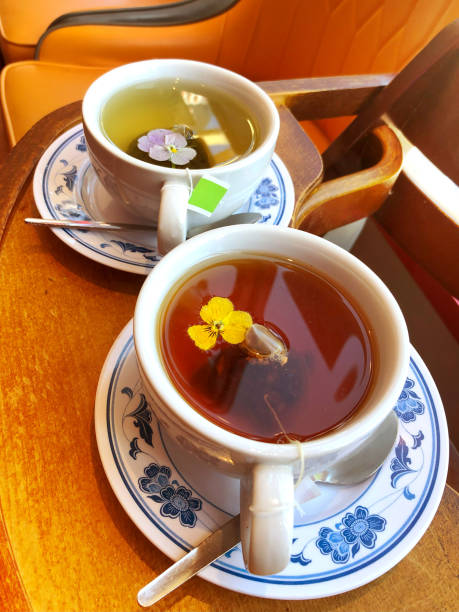 istock Green and Black Two Cup Of Refreshing Tea 2155286971