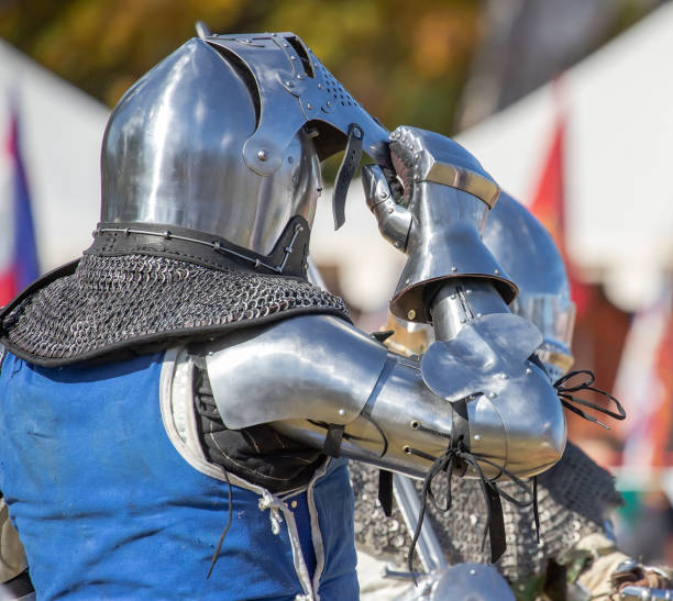 istock Elements of medieval iron knight armor for battle, helmet, spaulders, pouldrons, vambraces, gauntlets 2155287664