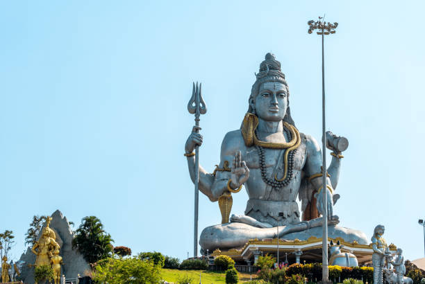istock Majestic Lord Shiva Statue Against Clear Blue Sky 2155300026