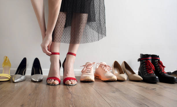Woman chooses her shoes