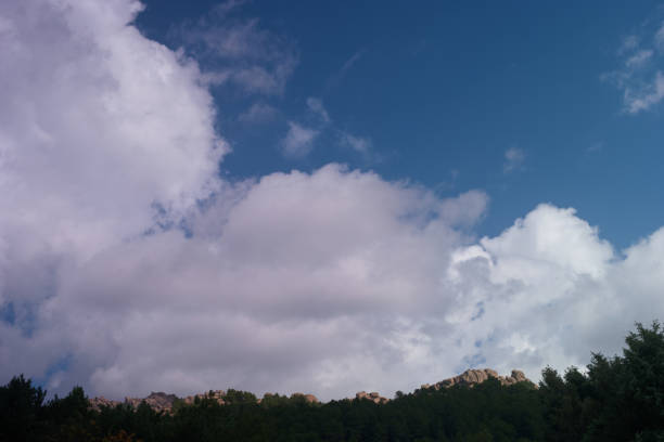 spring view on a cloudy day to the Sierra de Guadarrama mountains near Madrid