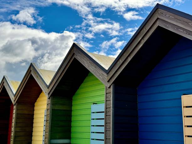 istock A row of multi coloured beach huts in Northumberland 2155314557