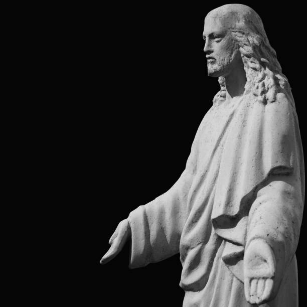 istock Jesus Christ statue against black background (fragment). Copy space. 2155315813