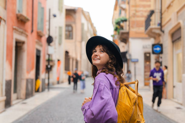 istock Woman exploring Verona during her vacation in Italy 2155317583