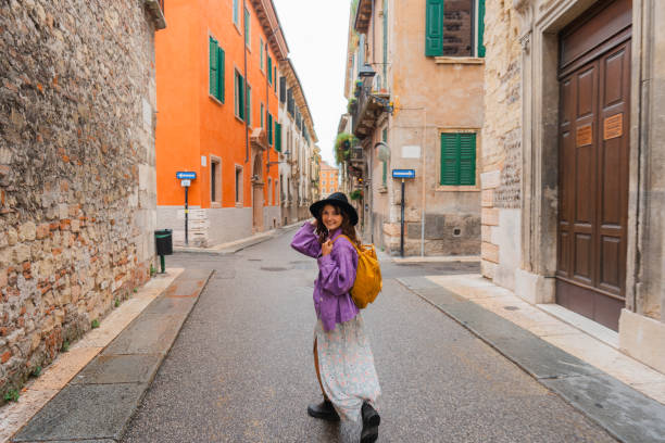 istock Woman exploring Verona during her vacation in Italy 2155318155