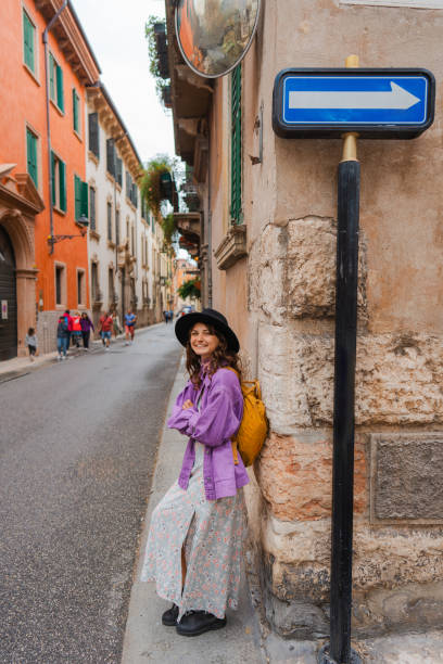 istock Woman exploring Verona during her vacation in Italy 2155318324