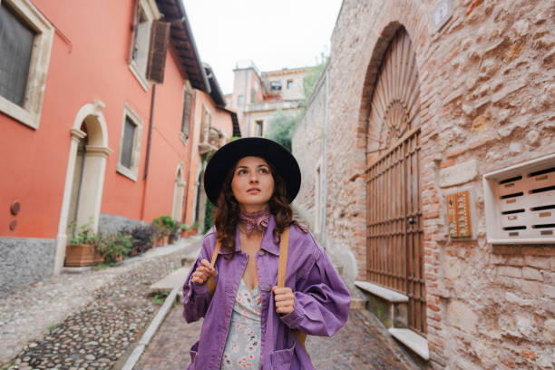 istock Woman exploring Verona during her vacation in Italy 2155318525