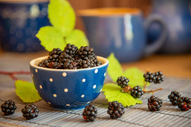 Blackberries in basket with decoration