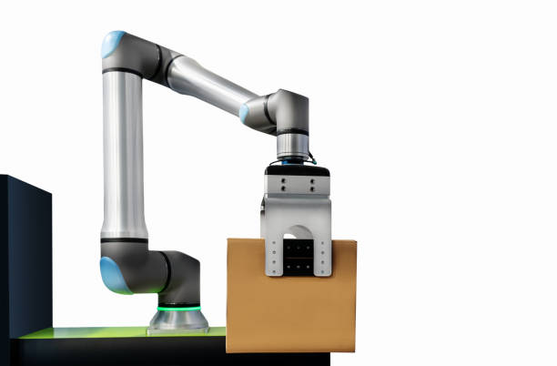 istock Isolated robotic arm picking and place cardboard box. Robotic material handling. 2155320007