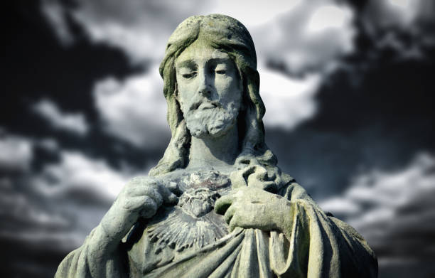 istock Jesus Christ the teacher. Very old stone statue. 2155322597