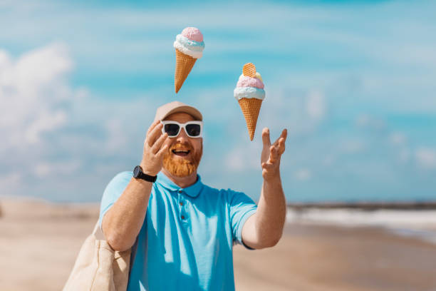 A handsome redhead man enjoying beach down time in Den Haag
