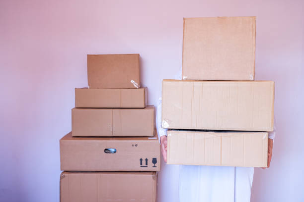 Stack of cartoon box for moving to  a new house