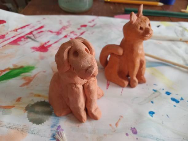 istock Terracotta dog, and cat 2155329677