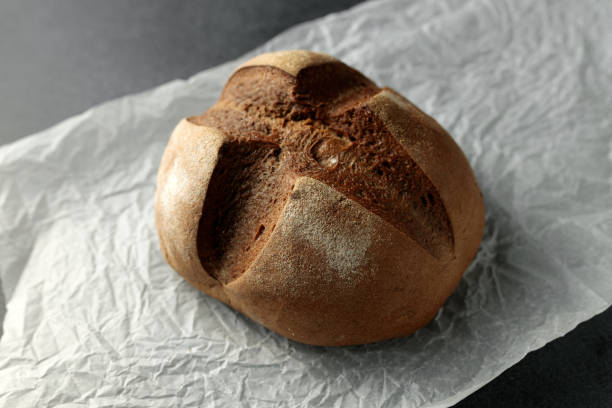 istock beautiful homemade raisin bread on parchment 2155333719