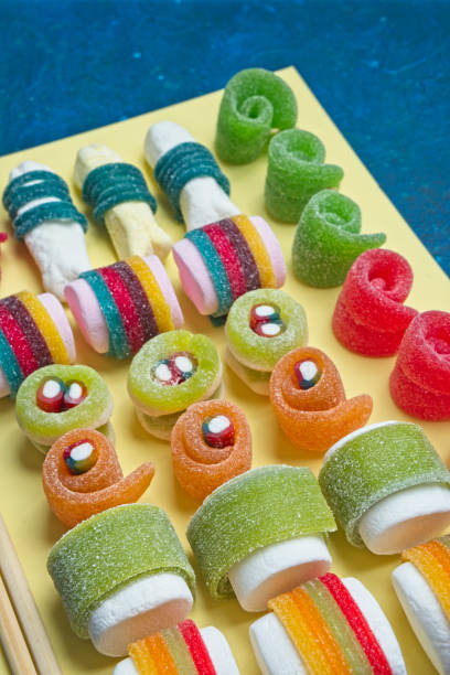 istock Various jelly strips, candies and marshmallows arranged to look like sushi 2155336980