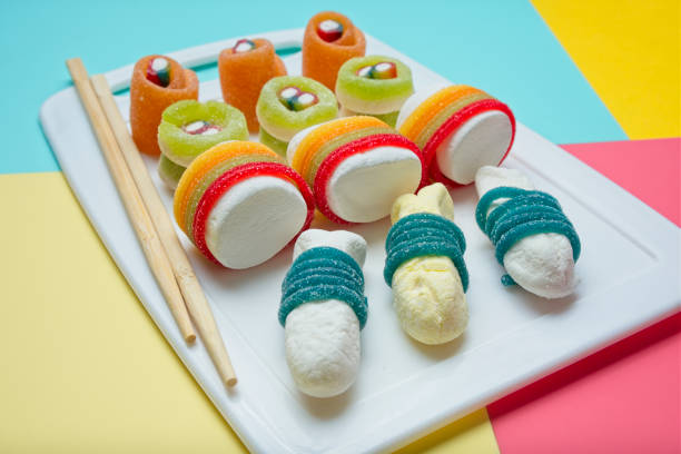 istock Various jelly strips, candies and marshmallows arranged to look like sushi 2155337058
