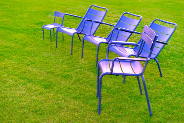 Chairs stand on the grass. Chairs for the family. Camping.