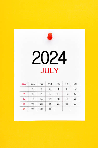 istock July 2024 calendar page with push pin on yellow. 2155351825