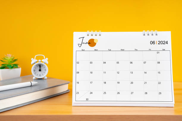 istock June desk calendar for 2024 year on work table with yellow. 2155351858