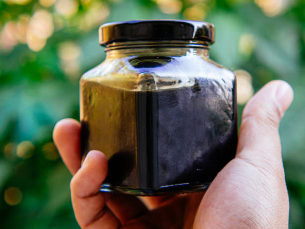 istock black oil in glass bottle 2155352056