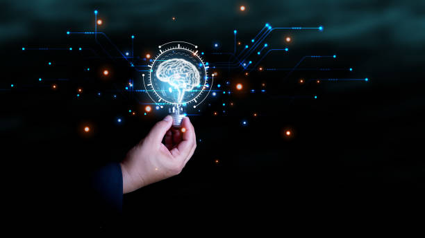 istock Innovative Businessman with Brain Illuminates Ideas Holding Light Bulb, Conceptual Creativity. Thoughtful Businessman Sparks Creativity Holding Light Bulb with Brain, Innovative Solutions Unveiled. 2155356012