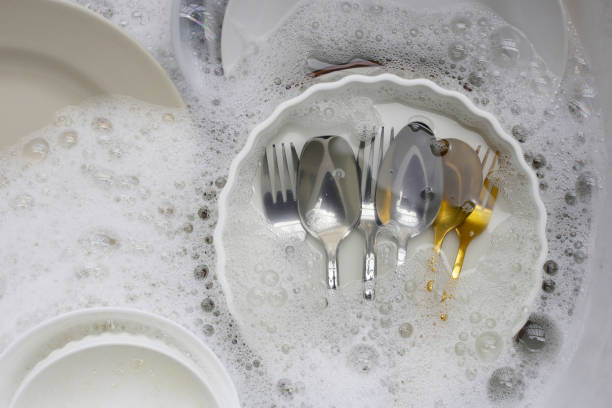 istock Dirty dishes, cleaning cooking utensils concept 2155356800