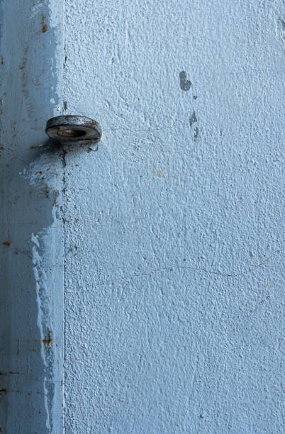 istock Vintage Door and Weathered Wall 2155357101