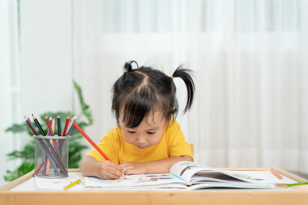istock Happy Asia children playing learning paint on paper. Activity, development, IQ, EQ, meditation, brain, muscles, essential skills, family having fun spending time together. Holiday 2155366709