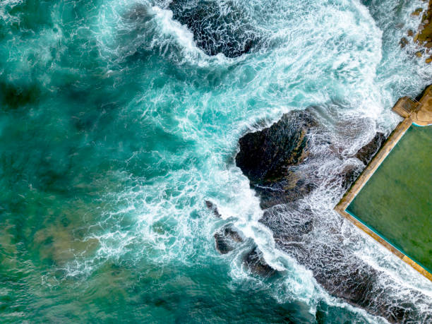 istock Waves crash around the rockpool at Bilgola Australia 2155366893