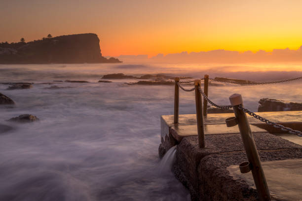Salty misty air as the sun rises at Avalon Beach