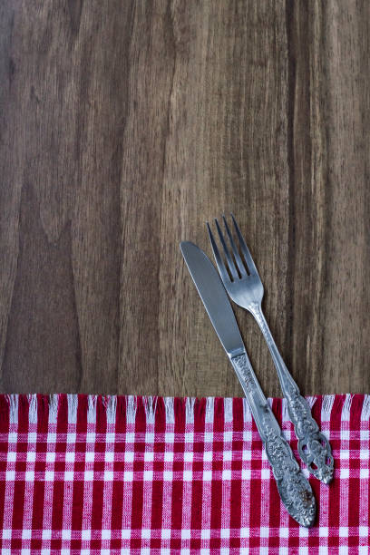 istock Vintage cutlery on wooden table 2155371423