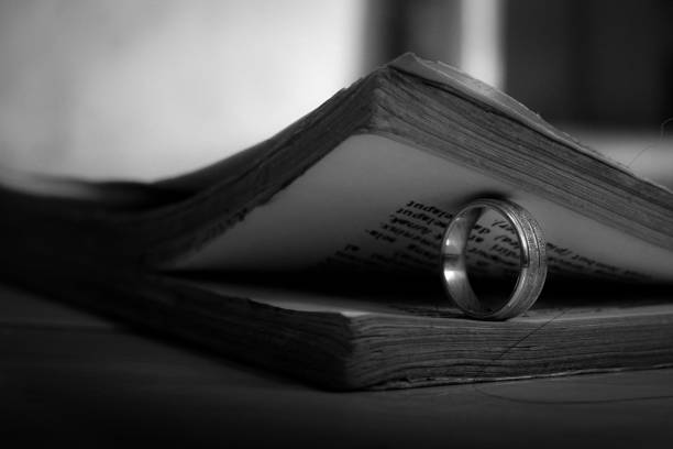 istock A ring pressed against the pages of a book 2155372896