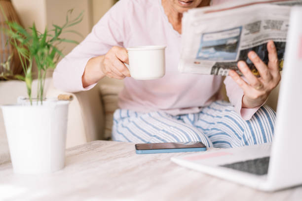 istock Relaxed Morning With Coffee And Newspaper. 2155376220