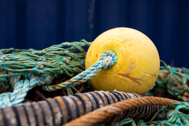 istock Close-up of a yellow fishing float 2155376770