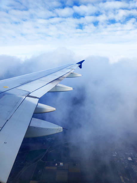 flying in the airplane and looking through the window