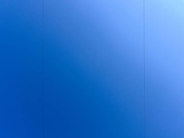 Wires against the blue sky. Gradient of the blue morning sky. Copy text