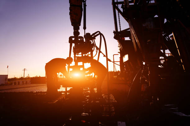 istock Oil drilling exploration, the oil workers are working 2155380197