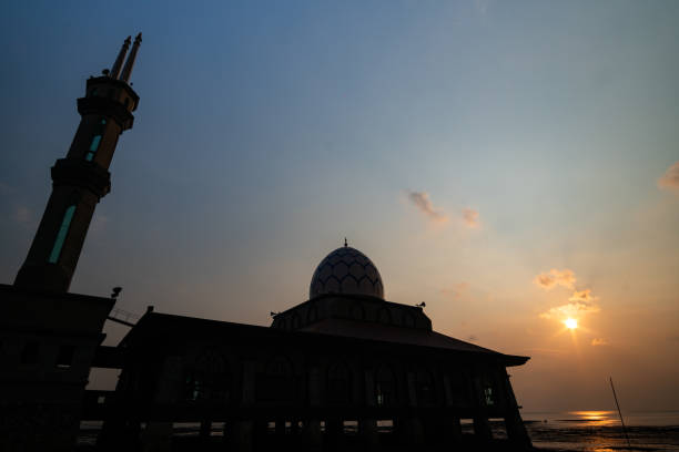 istock Silhouette of mosque on sea 2155380676