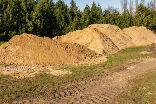 istock piles of construction sand are poured outside 2155380751