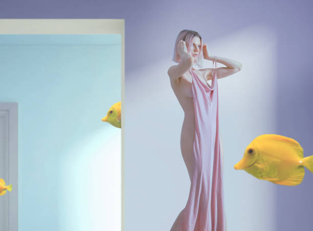 istock Young woman in her home 2155381115
