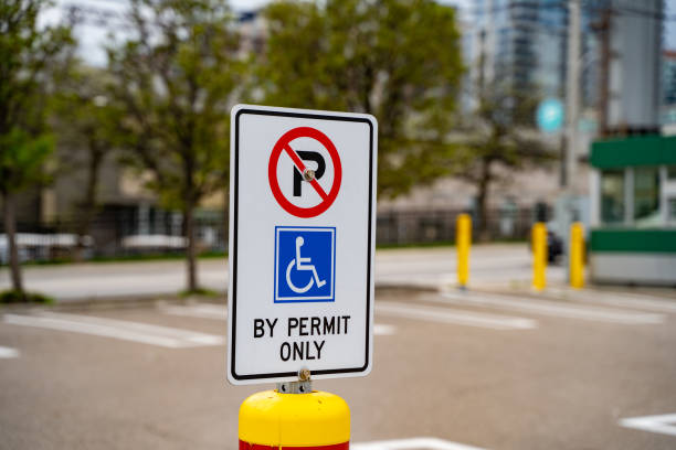 Handicapped parking sign in the parking lot.