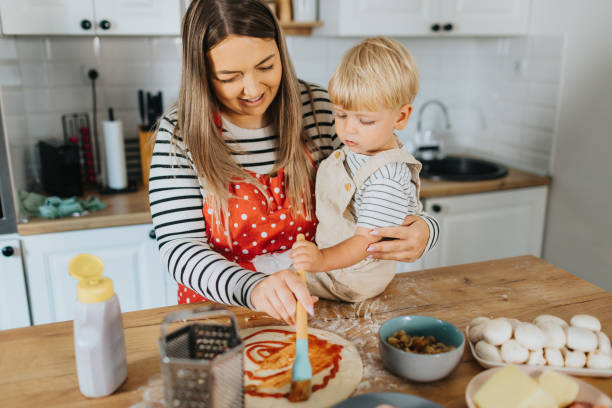 istock I enjoy cooking with my mom 2155384320