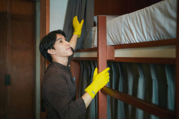 Professional Hostel Staff Dedicated to Room Cleaning and Maintenance for a Welcoming Stay.