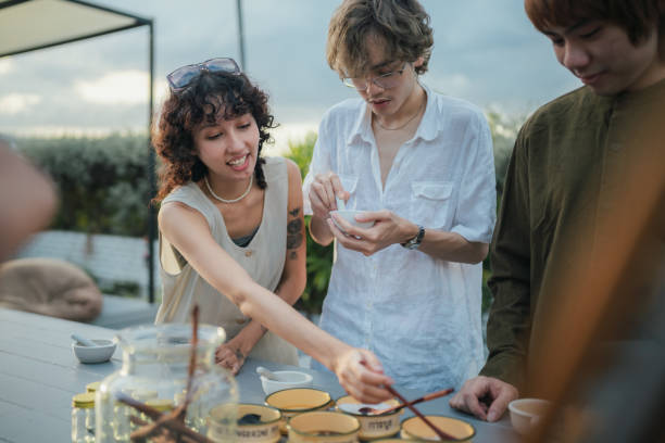 istock Tourists Participate in Herbal Inhaler Workshop at Hostel. 2155387833