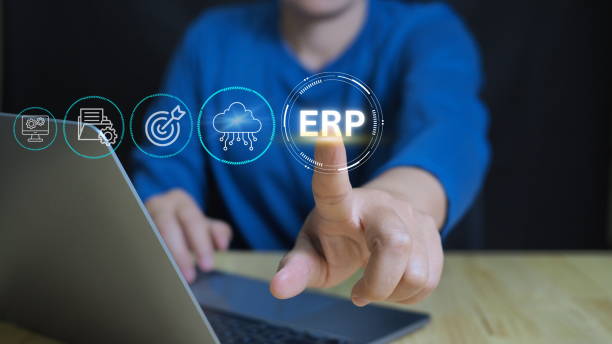 istock Businessman use laptop to analyzing ERP system on virtual screen.ERP, Enterprise resource planning concept. Connections between business intelligence, HR and CRM modules. 2155389972