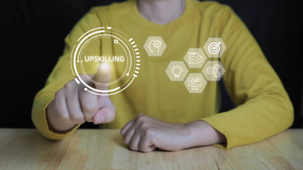 istock Businessman touching skills icon on virtual screen. Learning new and enhanced skills for career development. training, attending conferences.Upskilling concept. 2155389996