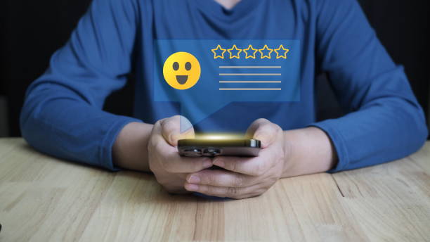 istock Person using smartphone give rating to service experience on online application, 5-star satisfaction.feedback review, good quality most. 2155390002