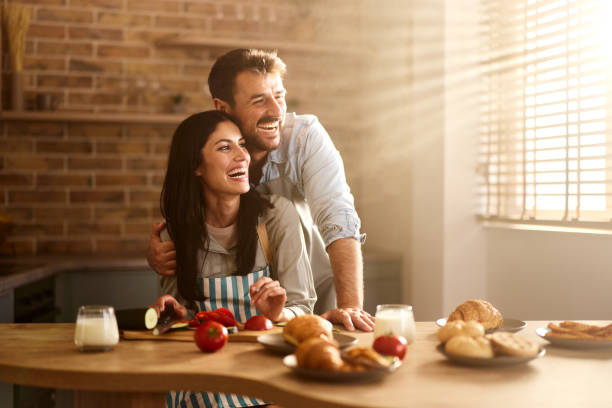 istock Happy couple in love enjoying in the kitchen. 2155395135